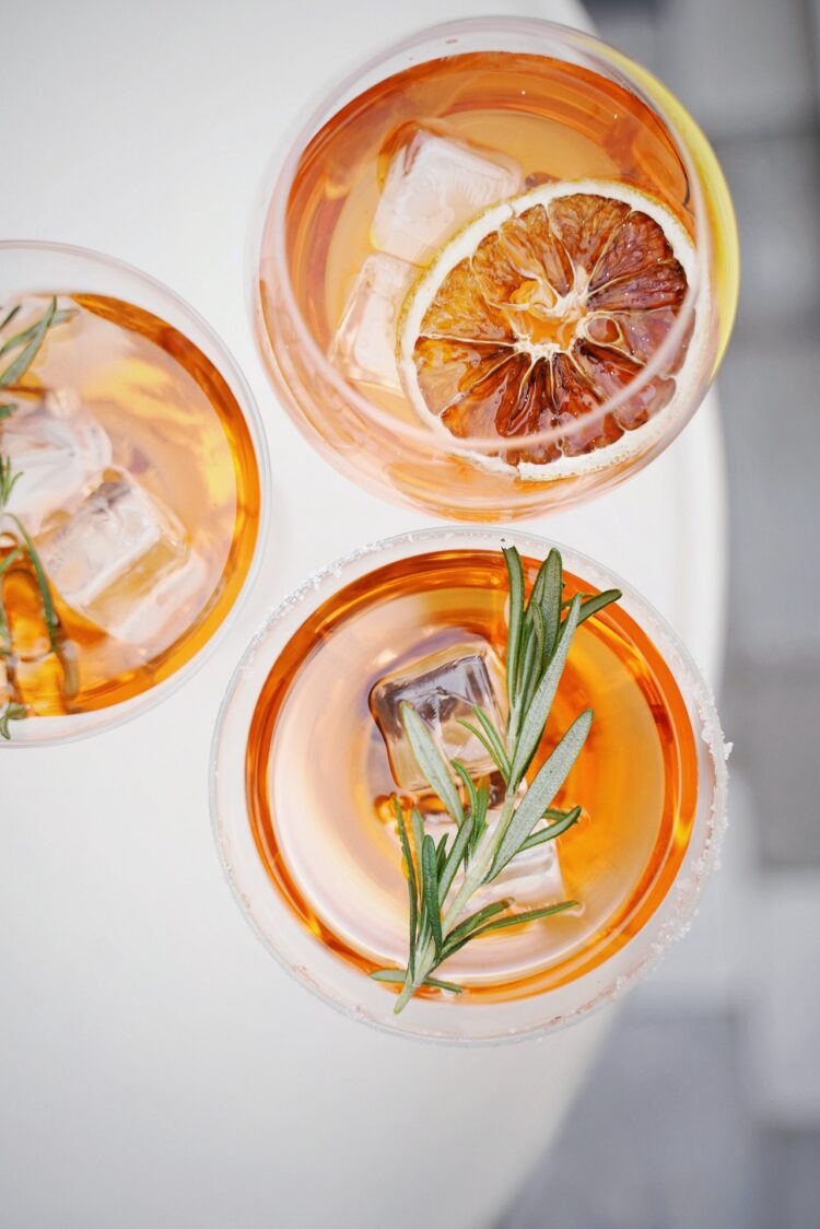 Sliced orange fruit in clear drinking glass 3323682