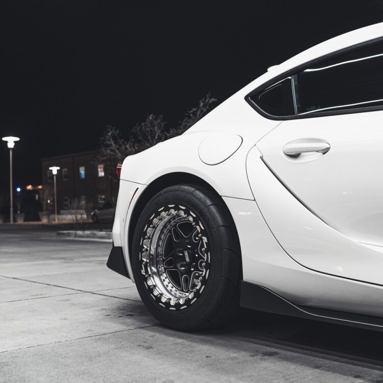 White car on gray concrete road during night time 3874342