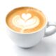 A cup of espresso with a dollop of whipped cream isolated on white background PNG