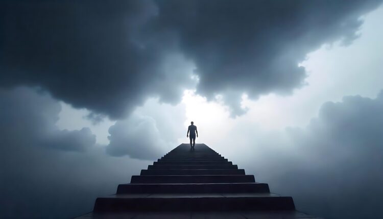 Ambitious business man climbing stairs