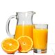 Jug and glass of pineapple juice with fruits isolated