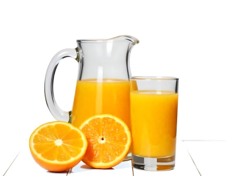 Jug and glass of pineapple juice with fruits isolated