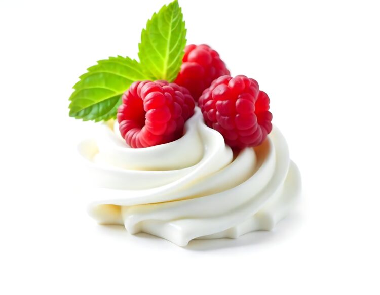 Raspberry with whipped cream on a spoon isolated on white background PNG