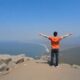 Tourist in Rio on the Sugar loaf looking at the Rio de Janeiro. Brazil